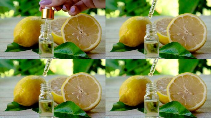 柠檬精油装在一个小瓶子里。选择性聚焦。自然。