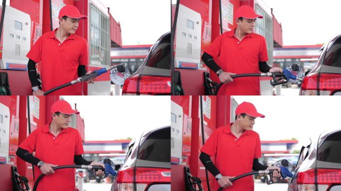 亚洲工人员工在加油站穿制服加油到汽车