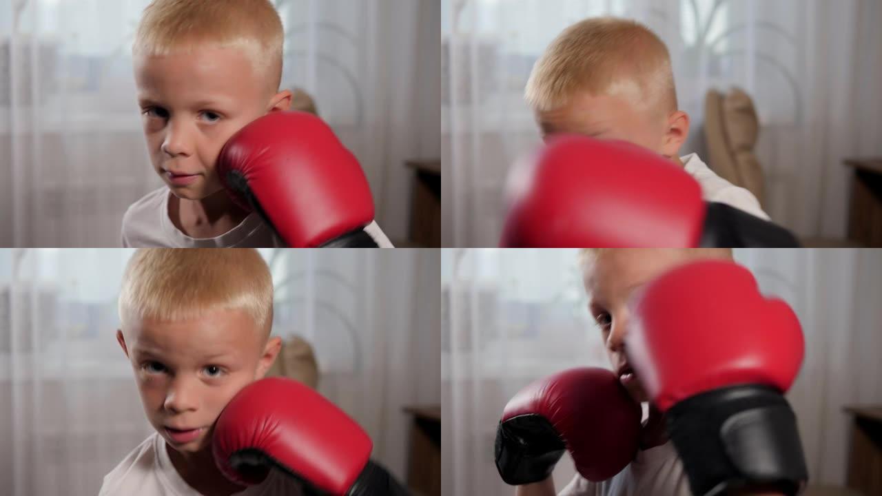 一个小男孩穿着拳击手套在家练习拳打的特写镜头。
