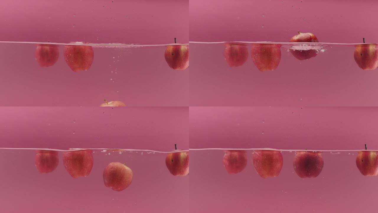 甜苹果掉入水中并溅入设计食品广告