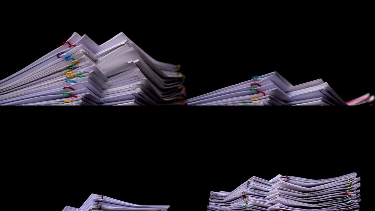 堆积超负荷的文件报告纸，4K停止运动。关键帧技术