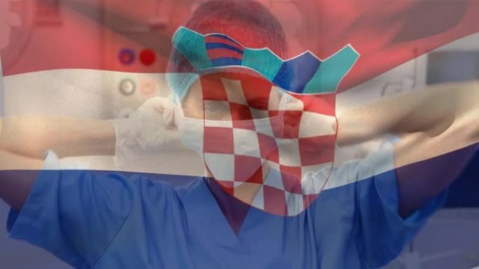 克罗地亚国旗在医院挥舞着戴着口罩的高加索女卫生工作者