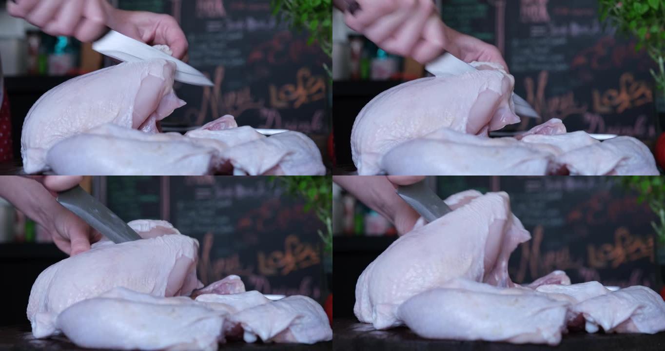 女性的手正在切出一整只鸡