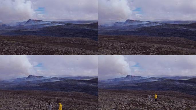 火山爆发，旅行者，广阔的岩石田野的壁纸视图