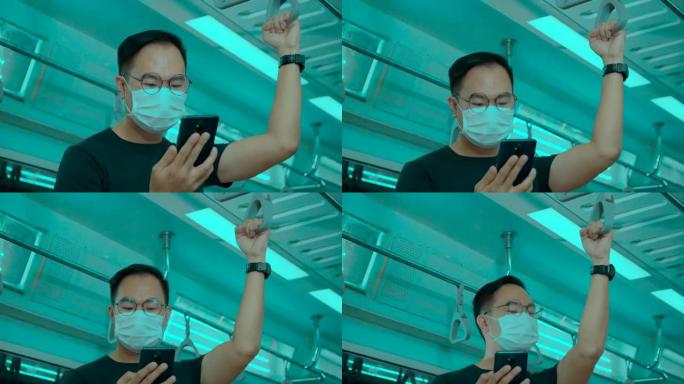 亚洲工人戴口罩，以防止在运输地铁旅行时新型冠状病毒肺炎。上班时要注意冠状病毒疫情。为了安全起见，社会