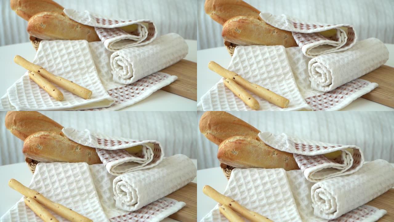 华夫饼新鲜厨房毛巾背景为篮子面包。棉质洗碗巾。茶巾。纺织业