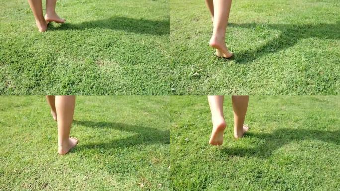 光着脚走在草地上，脚心呵护着小草