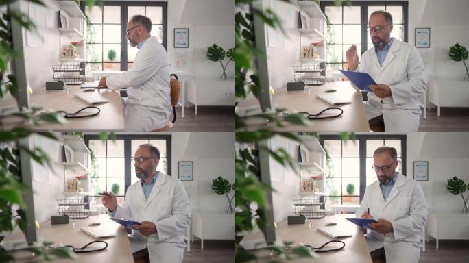 成熟的男性医生在办公室与患者进行视频通话