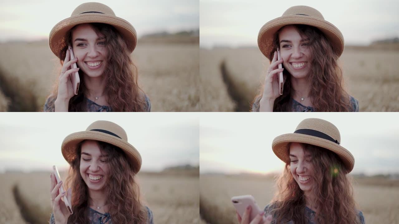 一幅戴着帽子的美丽女士在麦堆里微笑着打电话的画像