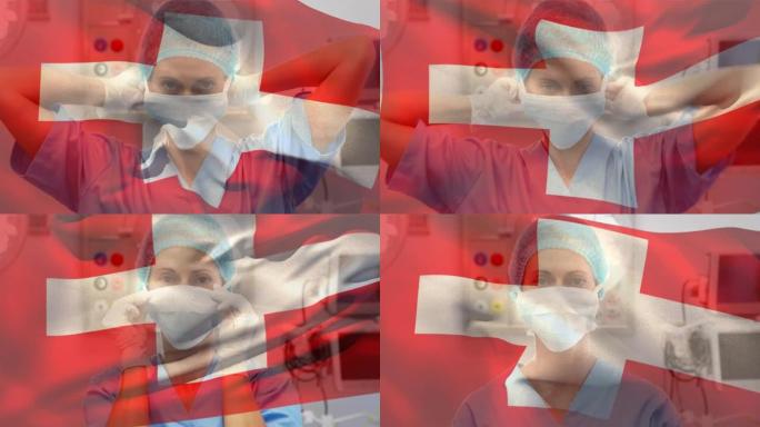 瑞士国旗在医院戴着口罩的女性卫生工作者身上挥舞