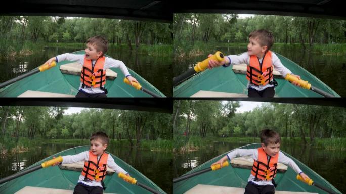 发展儿童在湖公园城市的船上划桨。孩子用桨乘船。学校放假期间的娱乐儿童营。男孩划船孩子。孩子在船河城市
