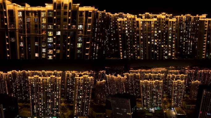 航拍-城市夜景居民楼-从窗户到城市全景