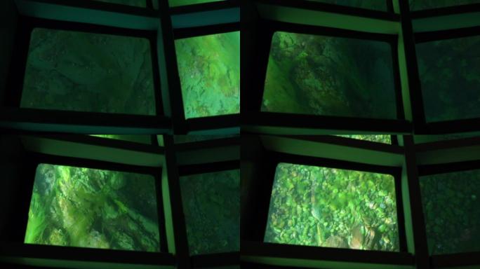 底部透明的船。水深。贝加尔湖。海底