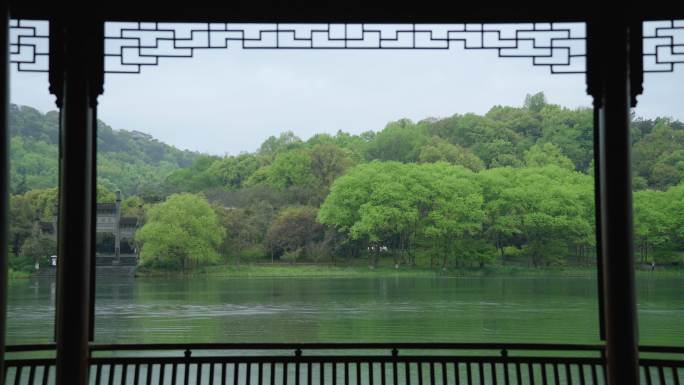 春天杭州乌龟潭阴雨天古建筑植物绿色自然