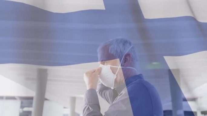 芬兰国旗在口罩上挥舞着男子的动画