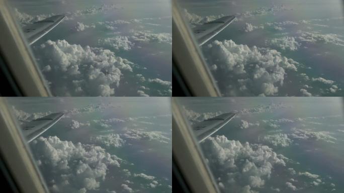 在云层上行驶-通过飞机窗口观看