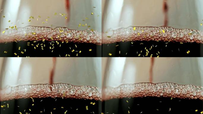 五彩纸屑在倒入玻璃杯中的香槟上的动画