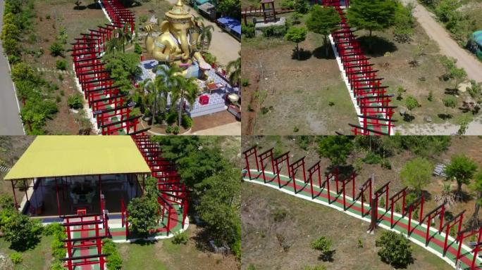 位于泰国北碧府的Wat Khao Sung Chaem法寺，有巨蛇和斜倚的金佛