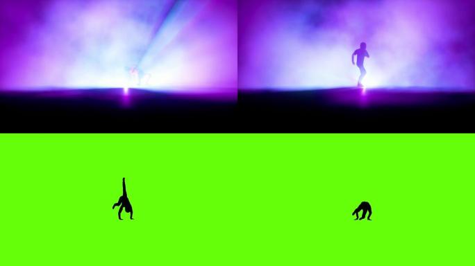 穿着摩托车服的霹雳舞者在舞台上对着五颜六色的聚光灯，绿屏跳舞