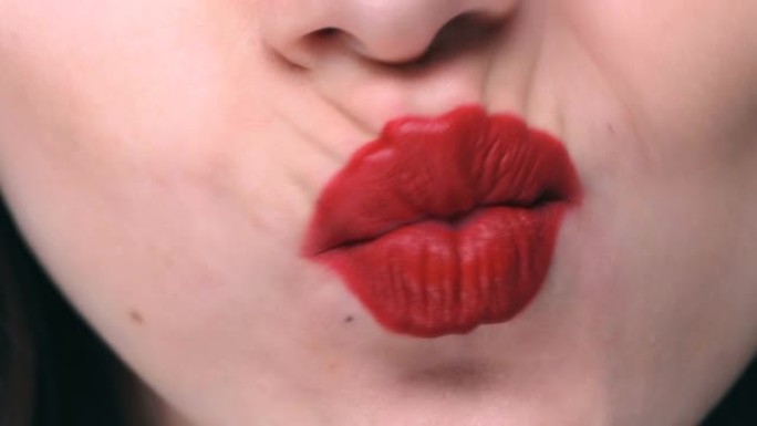 一个女性的红唇的特写