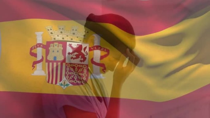 西班牙国旗的数字组成在医院挥舞着紧张的高加索女性卫生工作者