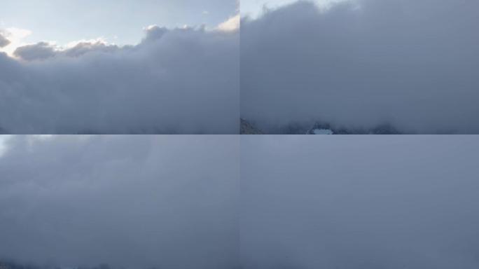 阴云密布，挡住了山上的景色。冬季山地景观。从贝特梅拉普看。阿莱奇竞技场。瓦莱州。