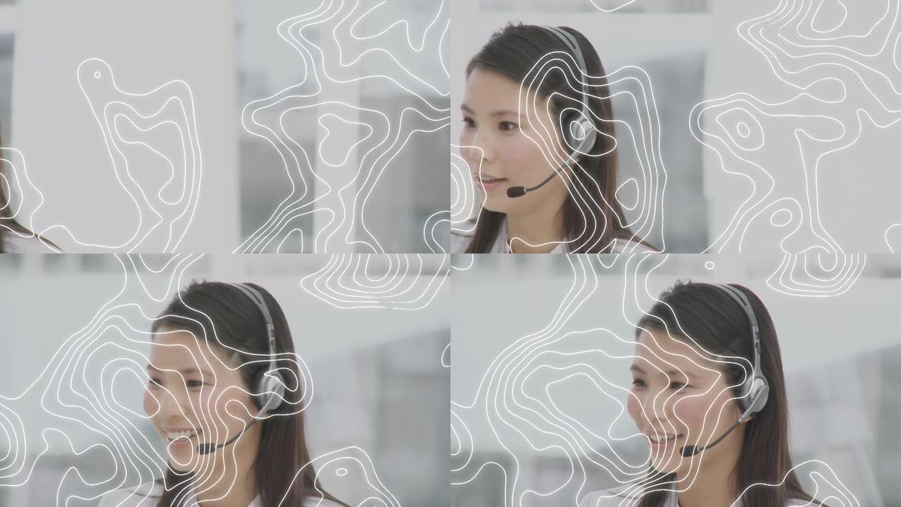 亚洲女性客户服务主管在办公室用电话耳机交谈的地形