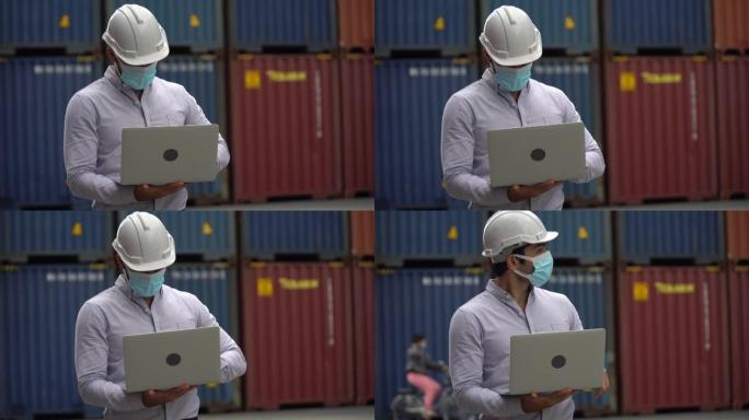 工头存放医用防护面罩，在货物仓库物流处存放笔记本电脑检查集装箱箱。在冠状病毒大流行或covid 19