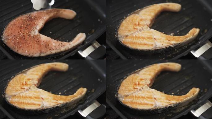 烤多汁的三文鱼，撒上黑胡椒。