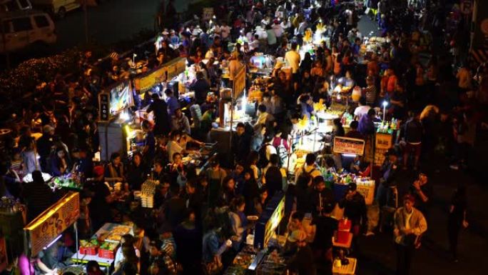 菲律宾巴吉罗市繁忙的街头市场人群的夜景