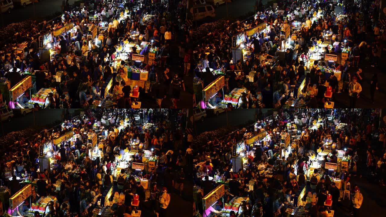 菲律宾巴吉罗市繁忙的街头市场人群的夜景