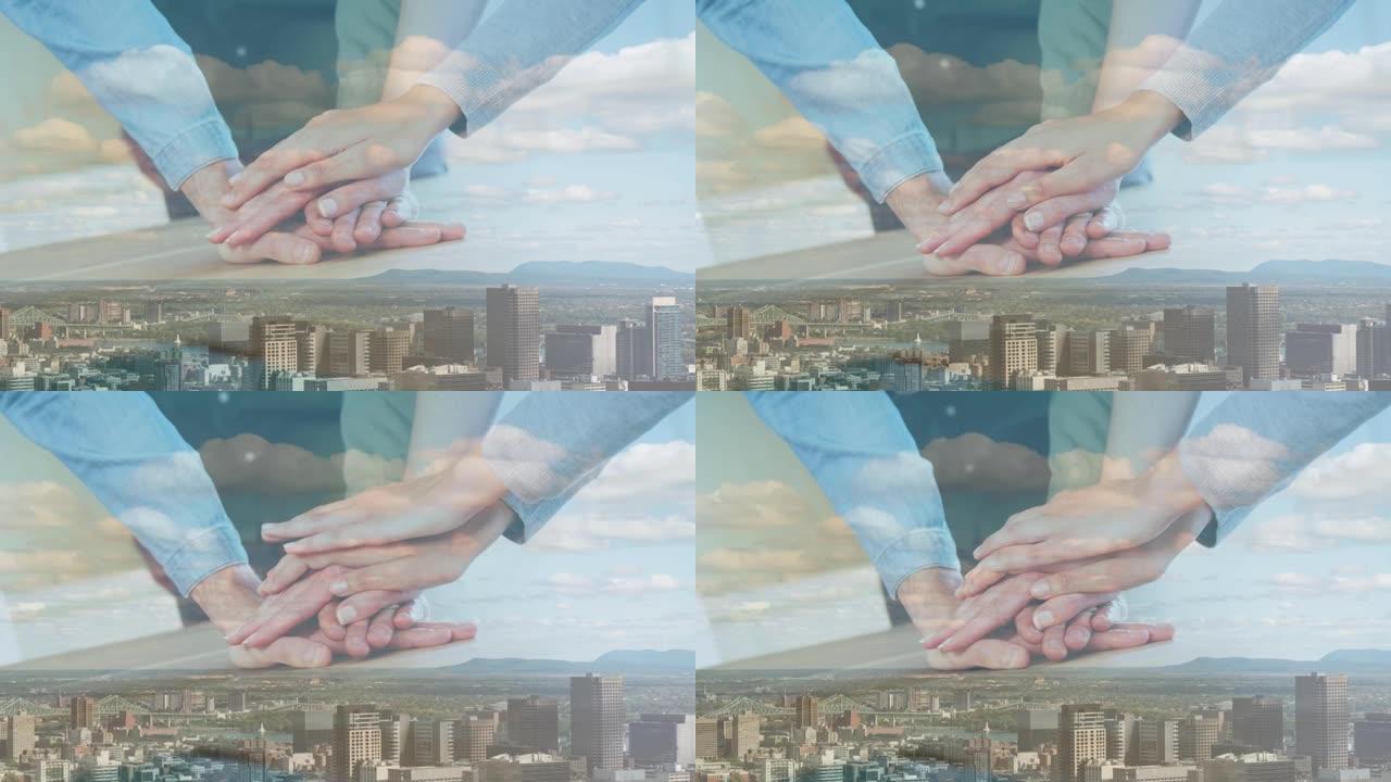 商业同事在城市景观上堆放双手的动画