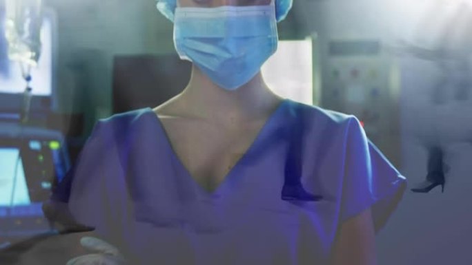 在医院戴口罩的女卫生工作者的肖像，以防止人们走路的时间流逝