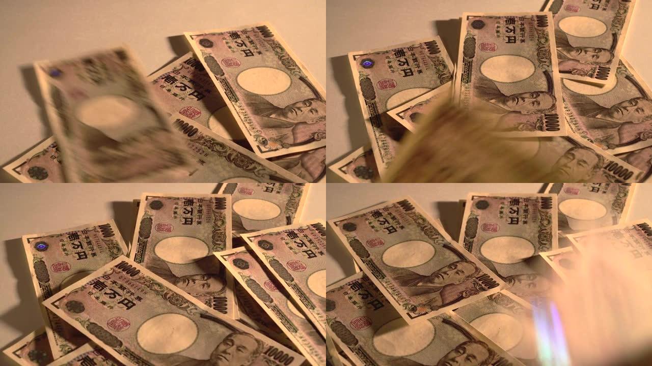 把10,000日元的钞票放在桌子上。
