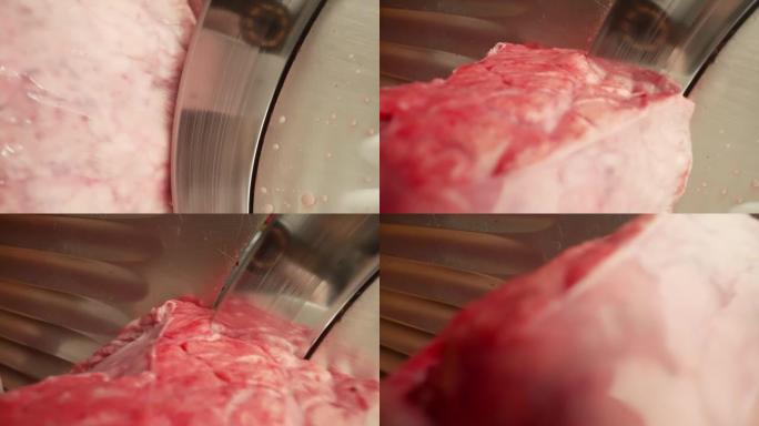 食品加工厂切肉切片机。肉是在一台特殊的机器上切的。切肉机