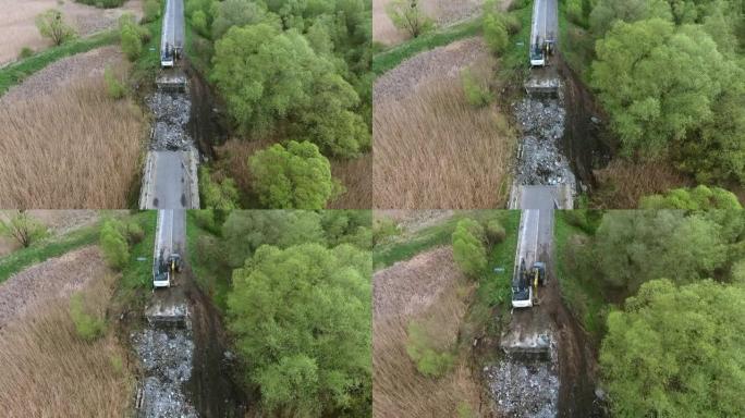 断桥，河流上的履带式挖掘机断路结构被摧毁的道路