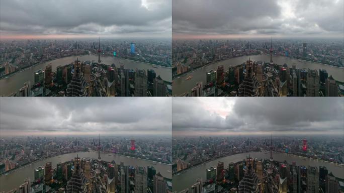 傍晚时分，上海城市的时间流逝，上海天际线的鸟瞰图，云层移动，地标上的灯光闪烁，4k镜头，b滚动镜头。