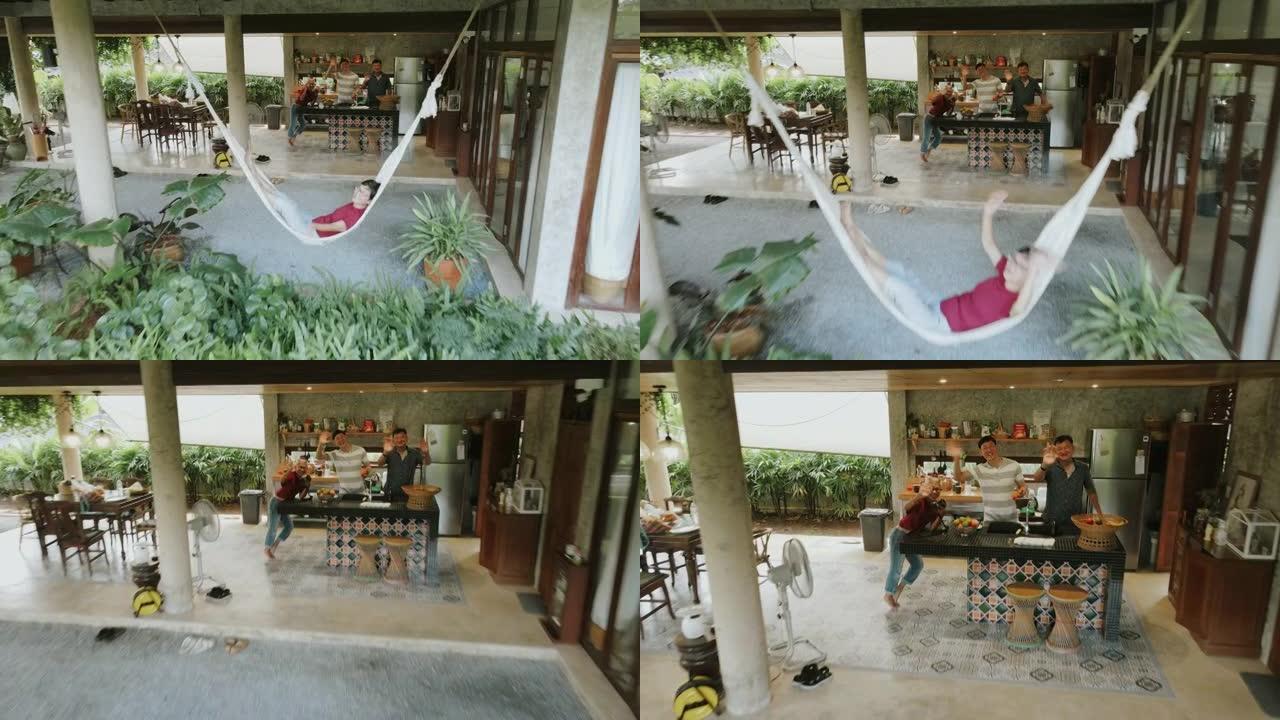 幸福的泰国家庭打招呼，向无人机摄像机挥手-股票视频