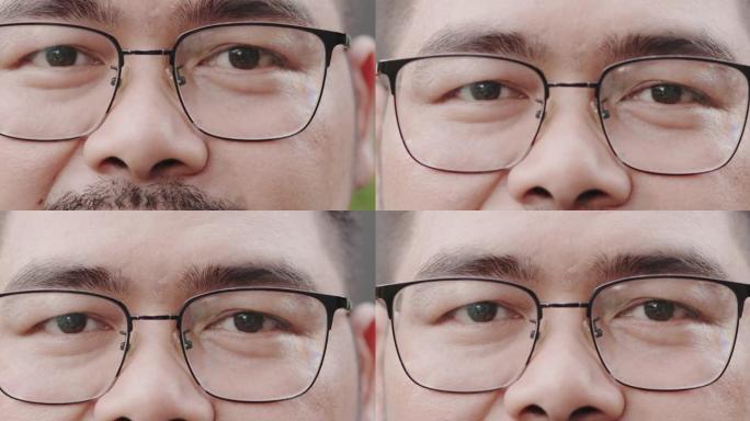 戴着眼镜和小胡子微笑着自信享受成功的迷人亚洲男人的特写肖像。看着相机开心。男性积极思考。肥胖人群健康