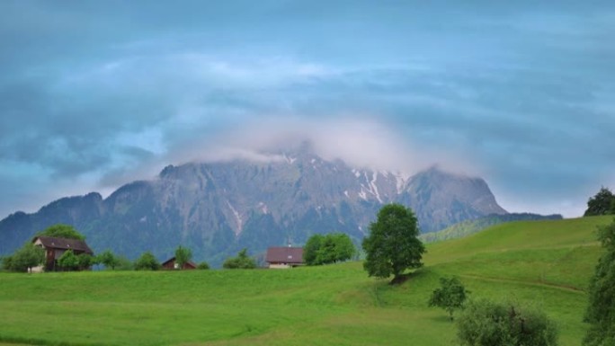 2018年5月13日瑞士皮拉图斯山霍鲁村。皮拉图斯山的缩放视图，云漂浮在山附近。皮拉图斯山的延时视频