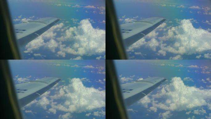 飞机机翼和云-通过飞机窗口查看