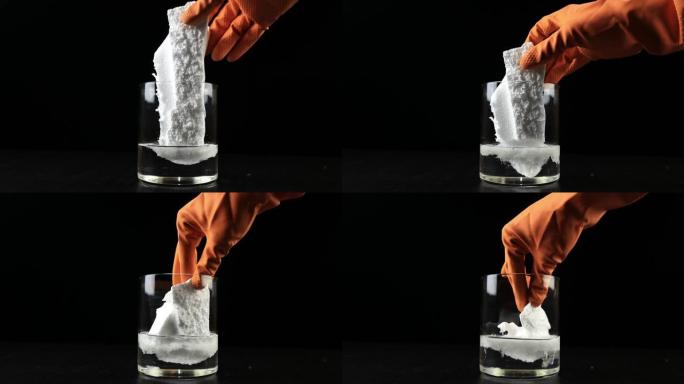 将聚苯乙烯泡沫塑料溶解在装有丙酮的玻璃碗中