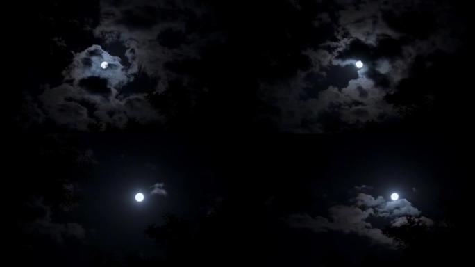 夜空中明亮的满月漂浮在云层中。一幅可怕的图画，夜惊心。