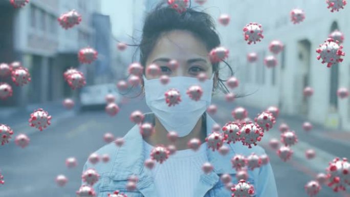 戴面罩的女人上的covid 19病毒细胞的动画