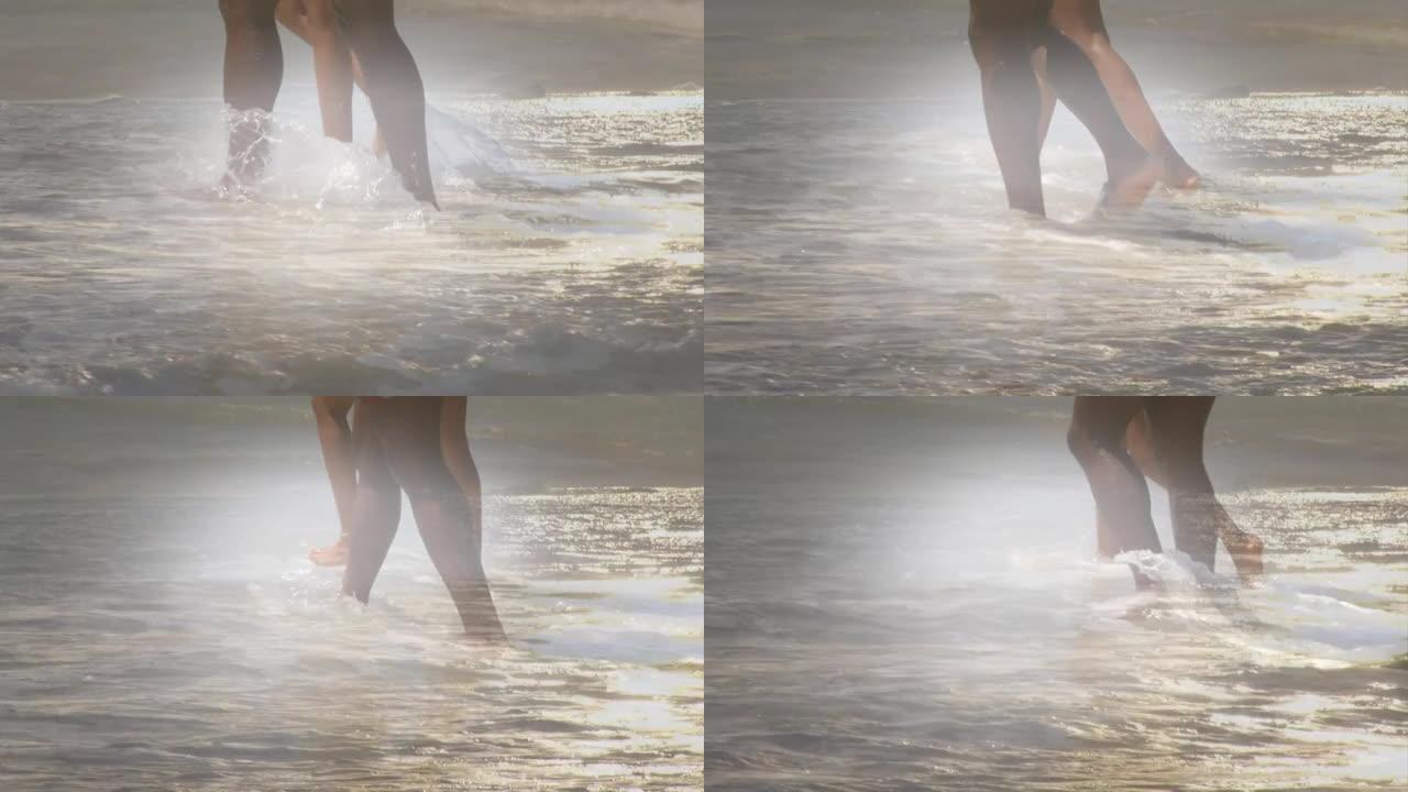 非裔美国人夫妇在海滩上海上行走的腿动画，在海上晒太阳