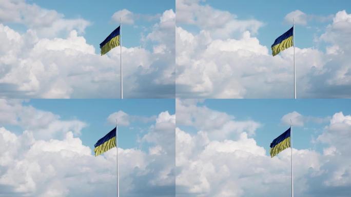 乌克兰的国旗是在天空和云层的背景下形成的。