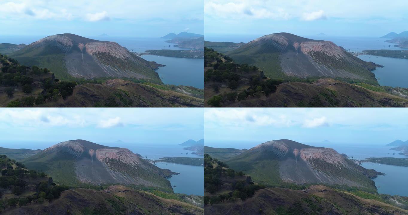 在夏季旅行中鸟瞰美丽的风景，大海，岛屿，绿色的山坡。在阳光明媚的日子里，西西里岛海岸的无人机观点。