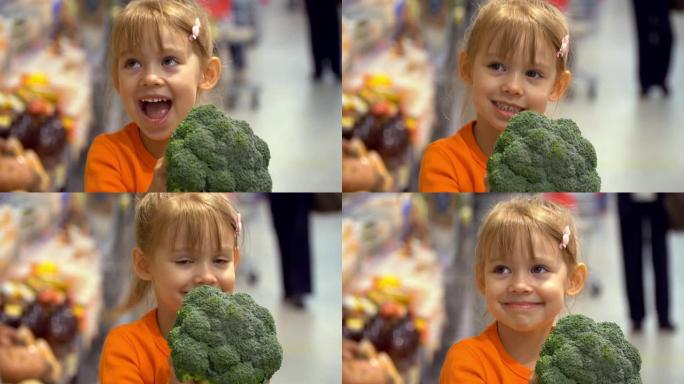 购物车里的小女孩在超市的蔬菜部门选择西兰花。健康素食。商店里的儿童购物食品。
