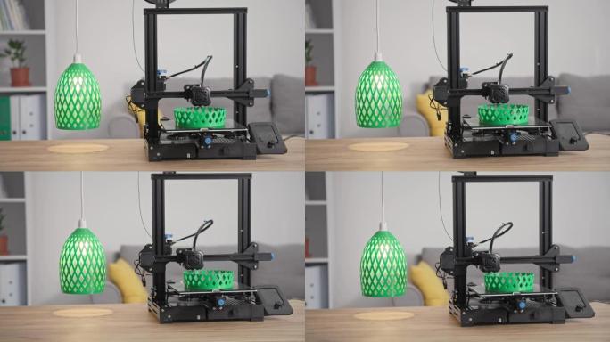 现代技术，自动3D打印机用熔融绿色塑料打印家用灯罩的原型