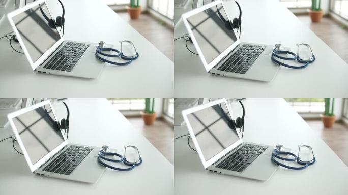 带听诊器的笔记本电脑，在线医疗保健概念